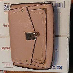 Boutique brand mauve pink crossbody/clutch. Faux leather